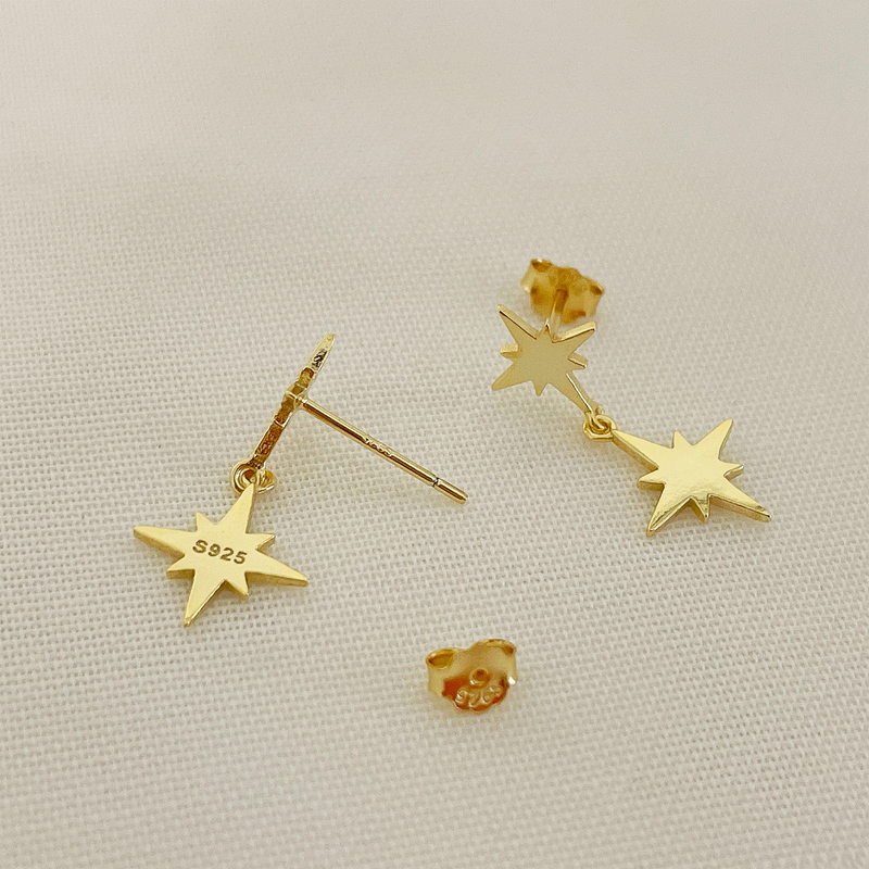 Orecchini doppia stella in oro